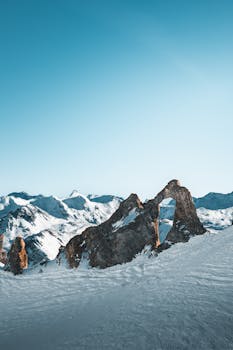 Explore the stunning snow-covered peaks of Val-d'Isère, France, a prime location for winter sports enthusiasts.