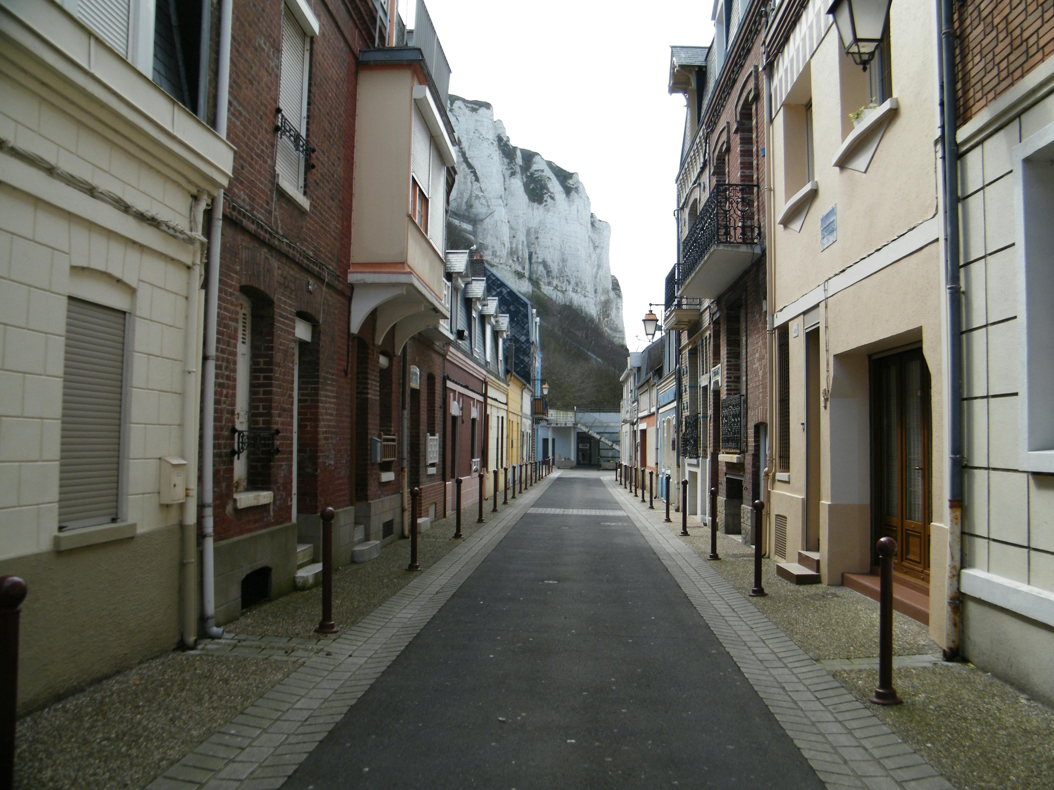 view of a street between buildings in le treport france