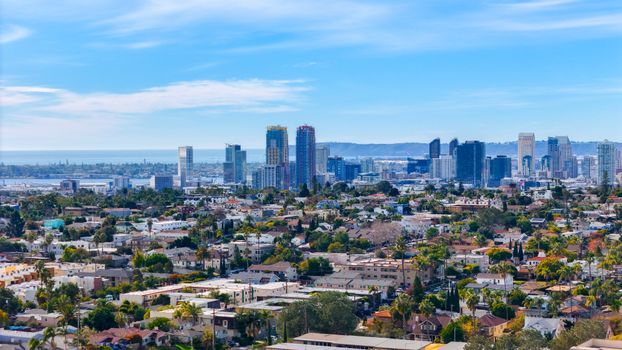 Stunning aerial cityscape of downtown San Diego featuring urban skyline and suburban sprawl.