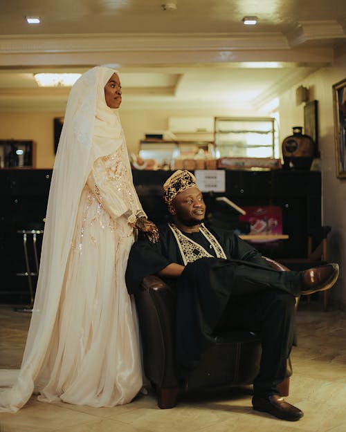 Woman and Man in Traditional Wedding Clothing 