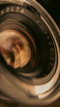 High-quality close-up image of a camera lens with detailed reflection, perfect for photography themes.