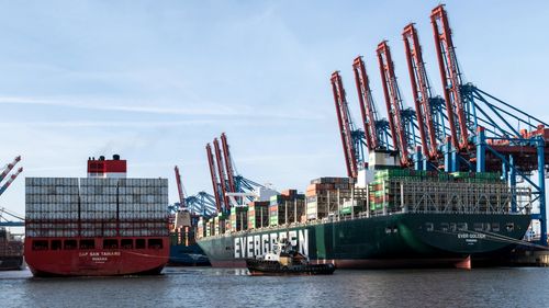 Free Container ships docked at Hamburg port showcasing logistics and industry. Stock Photo