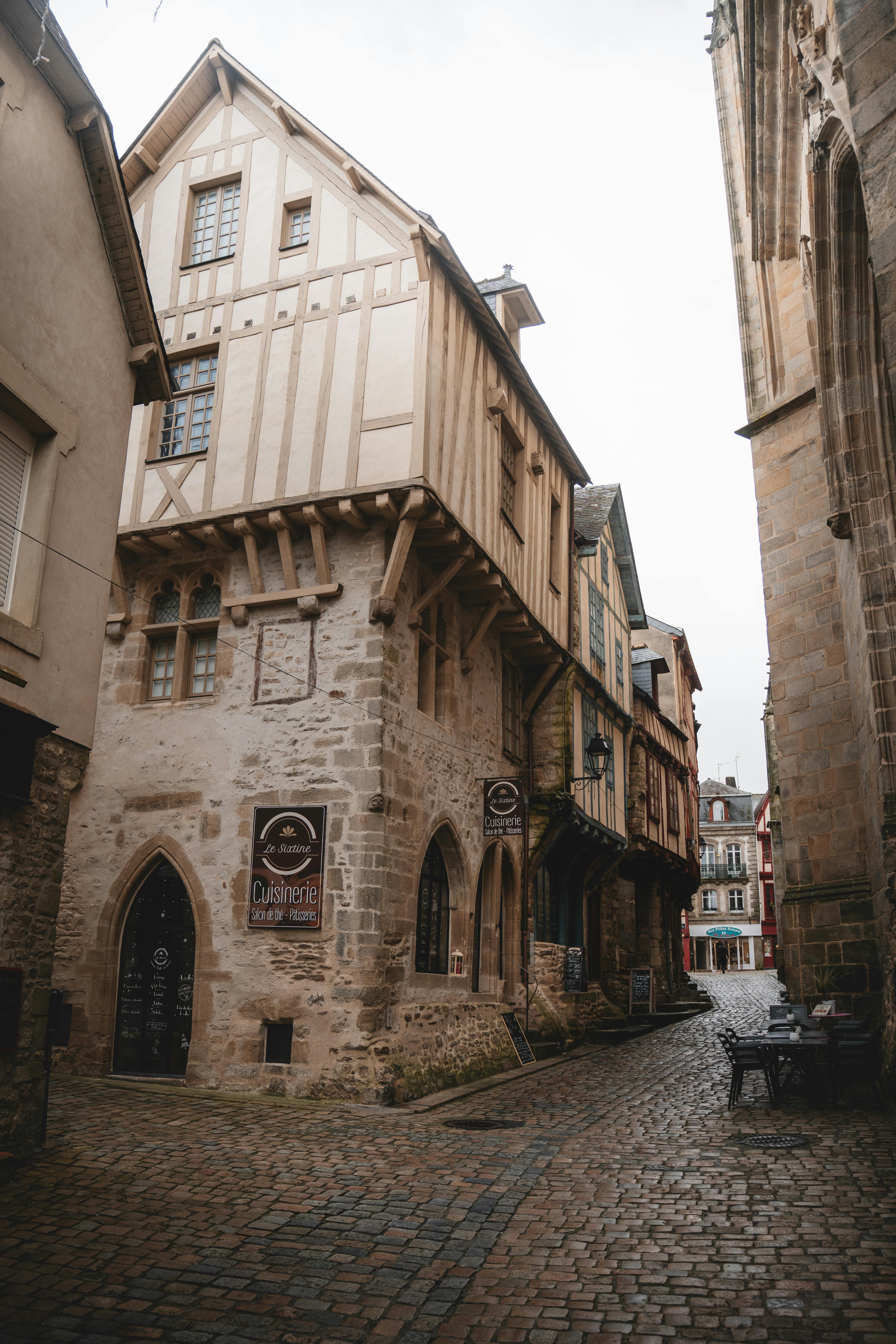 Explore the cobblestone streets and half-timbered houses of Vannes, showcasing medieval architecture.