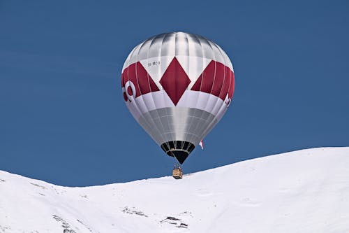 Hot Air Balloon in a Mountain Valley