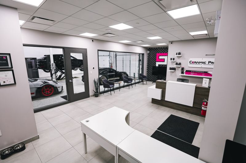 Spacious modern car salon with luxury vehicles
