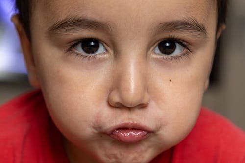 Free A Child Making a Face Stock Photo