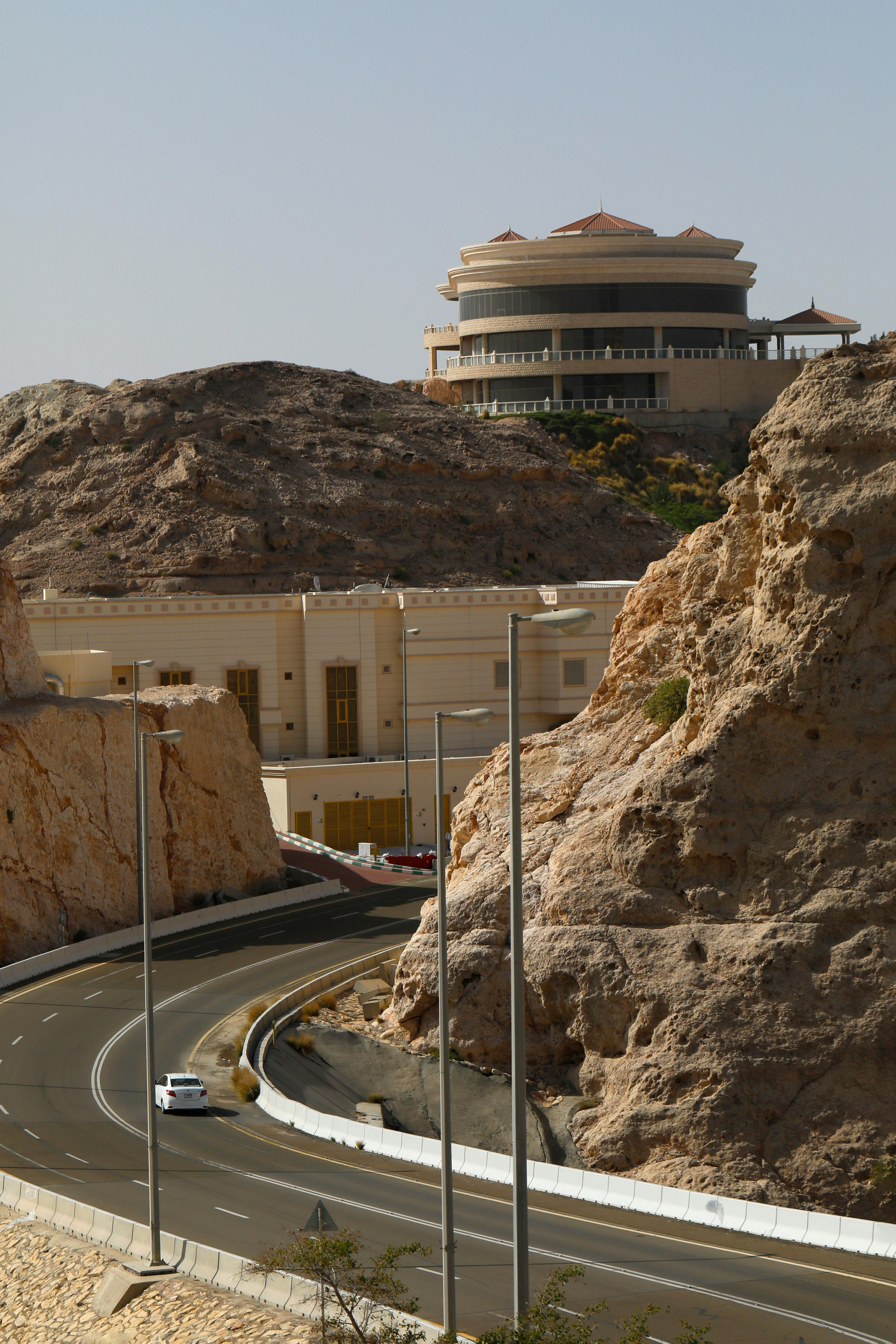 a road leading to the jabal hafeet tawam