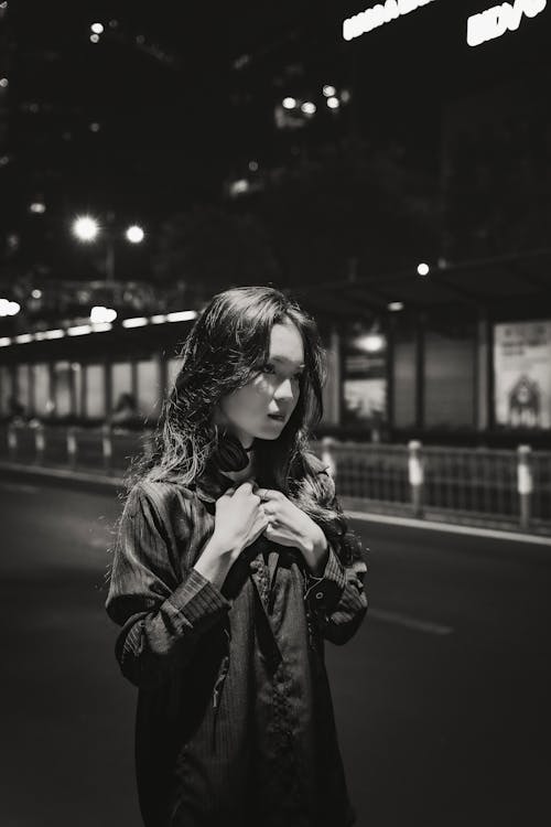Portrait of Woman on Street at Night