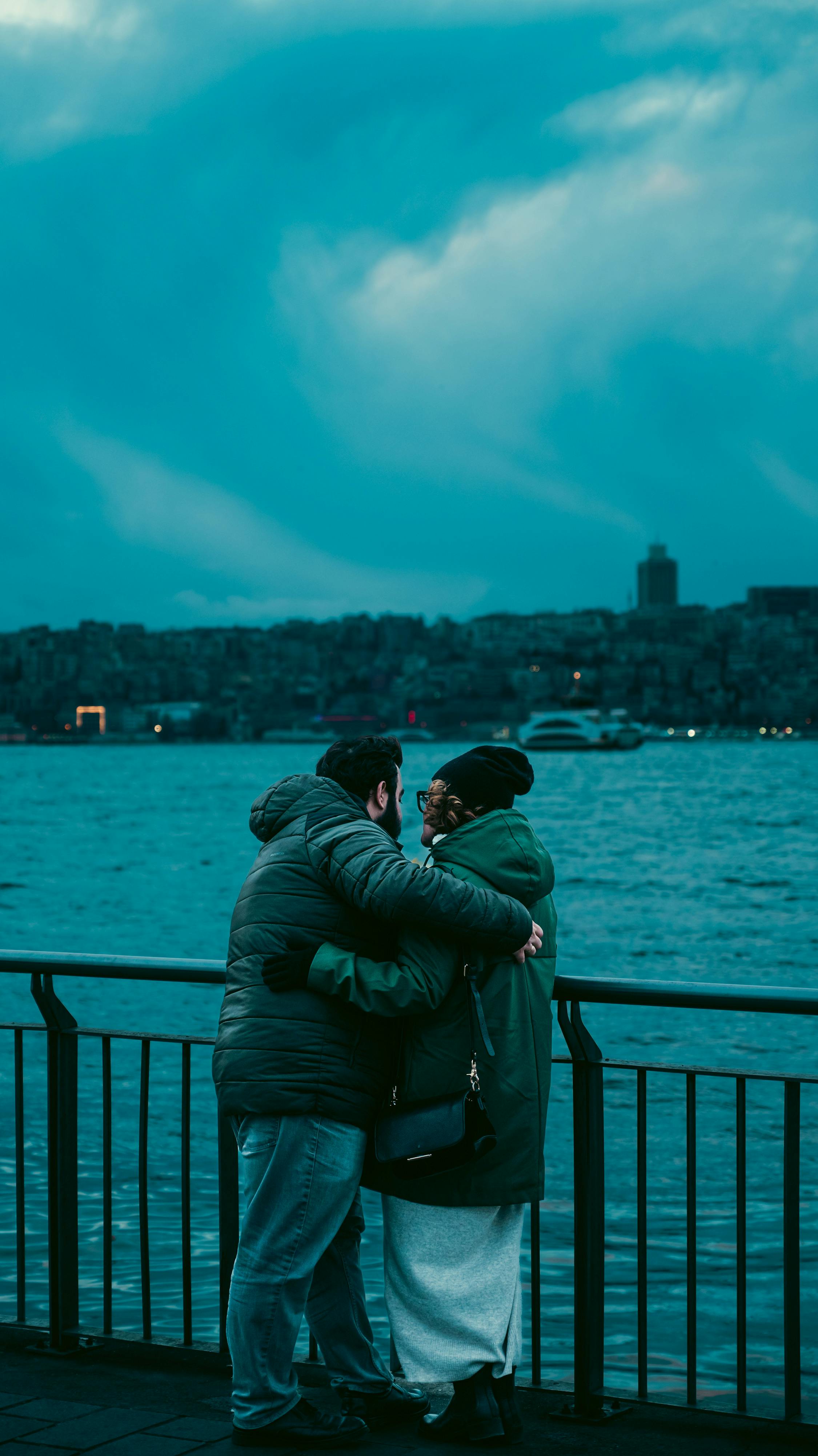 hugging couple on bridge in istanbul