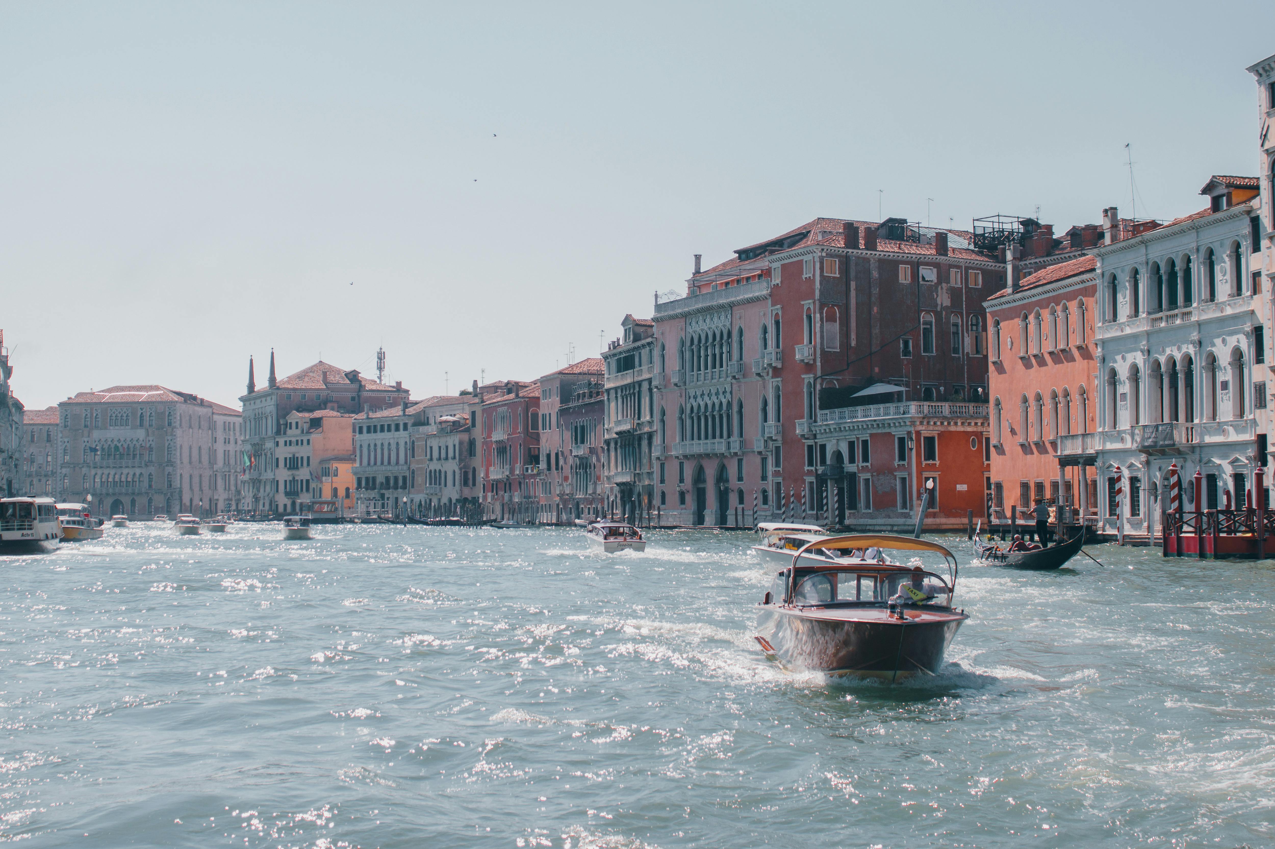 motorboats on canal grande in venice