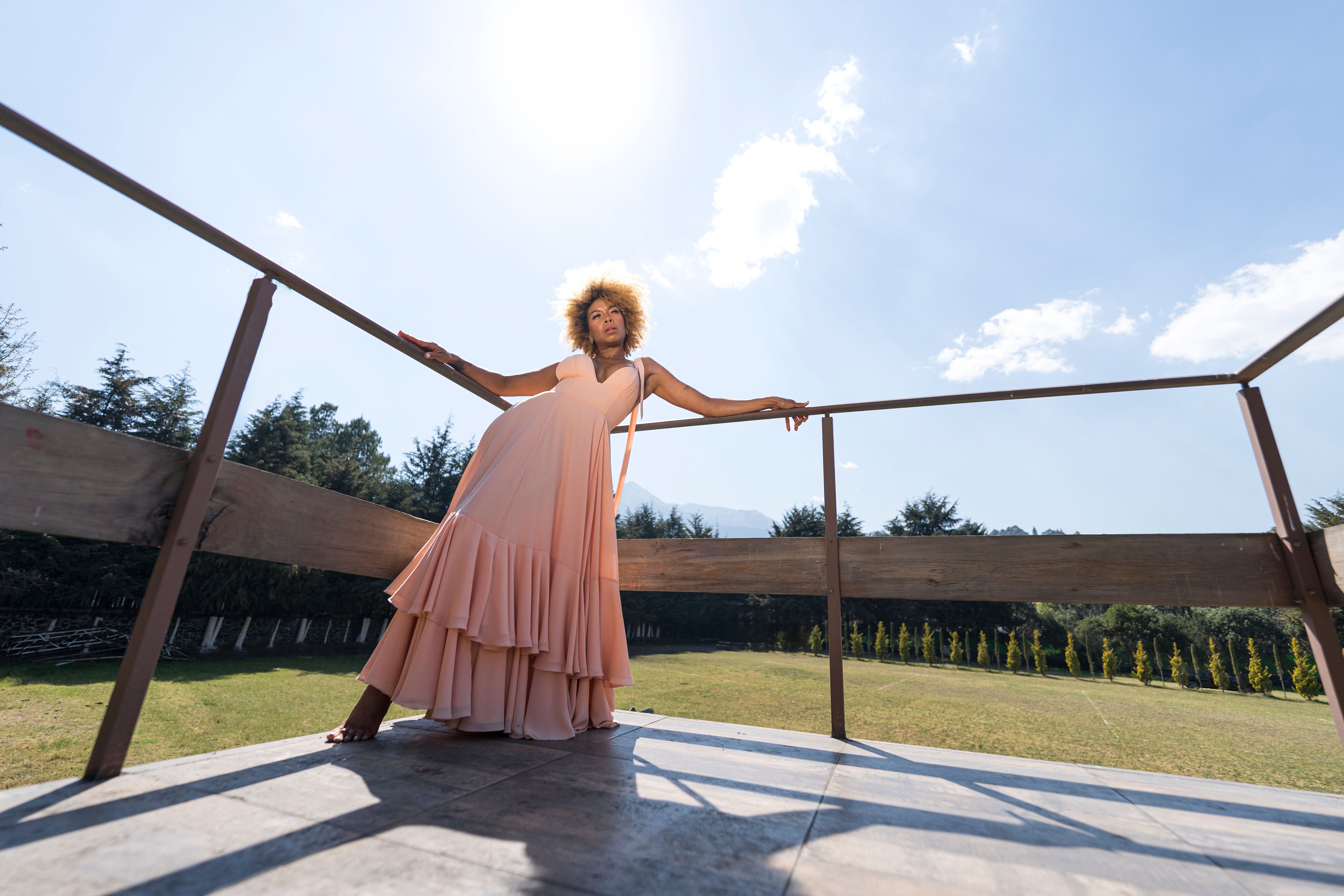 Model Leaning on the Railing · Free Stock Photo
