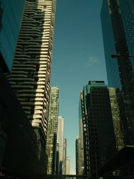 Explore the contemporary architecture and towering skyscrapers of downtown Toronto, Canada.