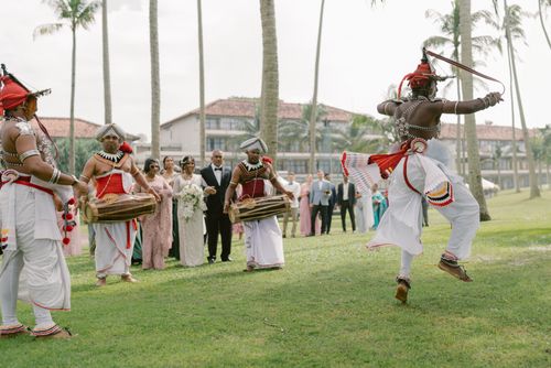 Free Kandyan dancers perform at a vibrant Sri Lankan wedding ceremony in Wadduwa. Stock Photo