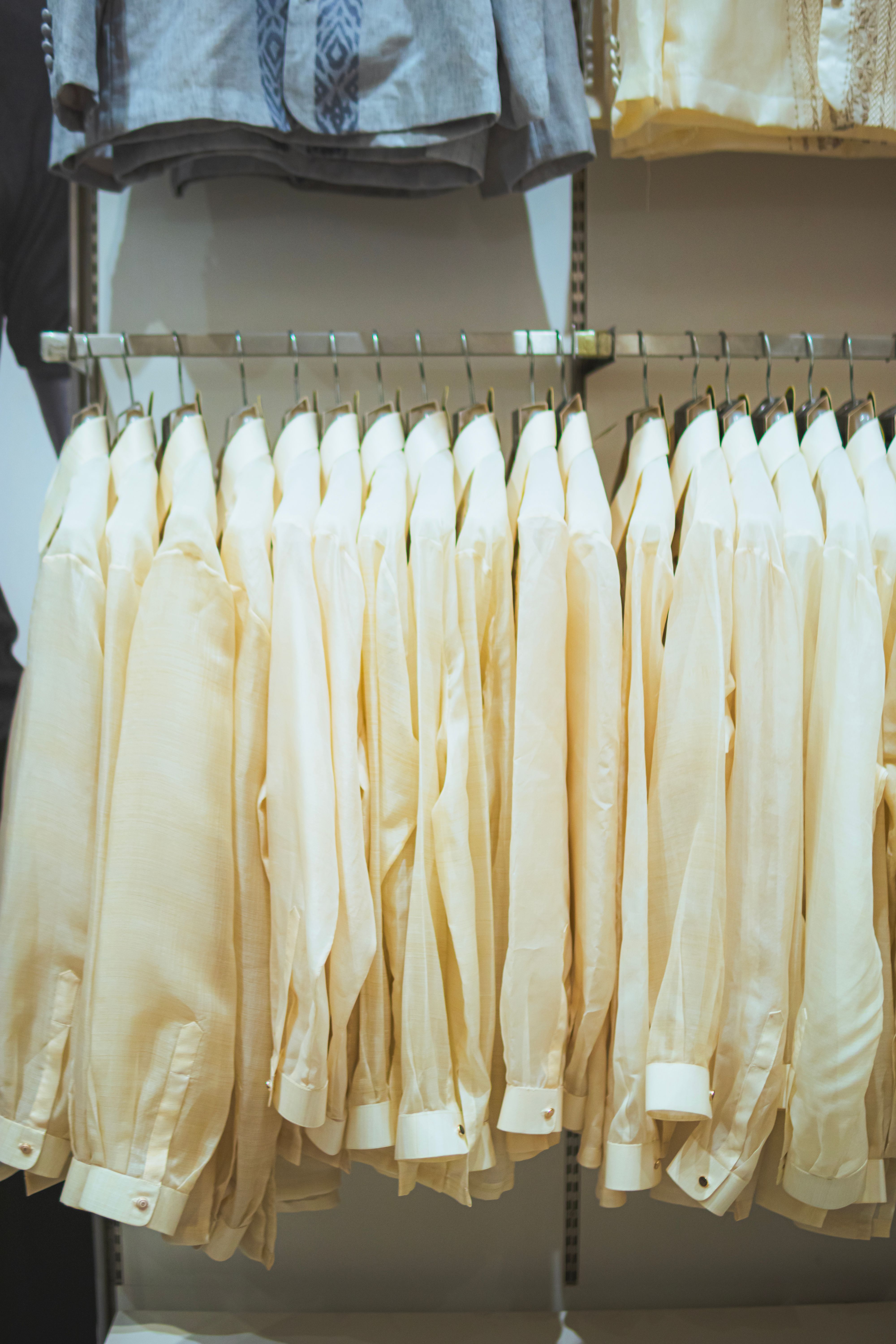 Representative shirts arranged in a menswear shop