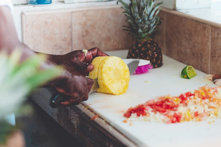 Person Chopping Fruit