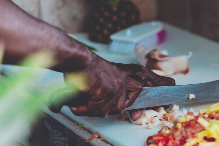 Man Chopping Vegetable