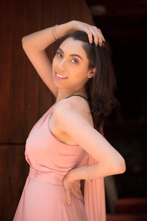 Woman Posing in a Pink Dress