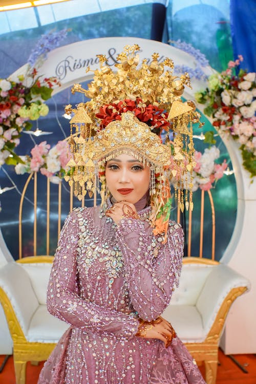 Portrait of Woman in Golden Crown and Traditional Wedding Clothing