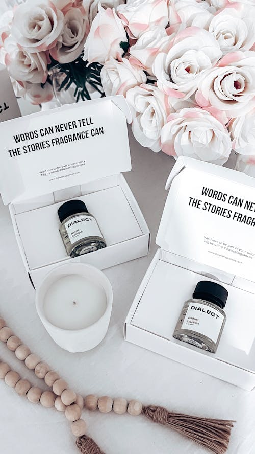 Free Two boxes of candles with a rose and a candle Stock Photo