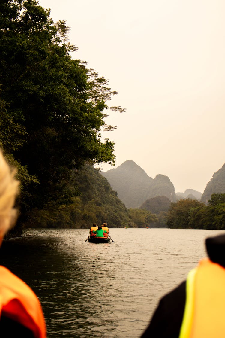 People Boating On River