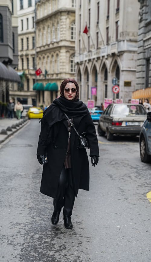 Woman in Black Coat on Street in Istanbul