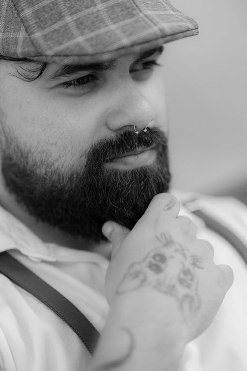 Man with Tattoos on Hand