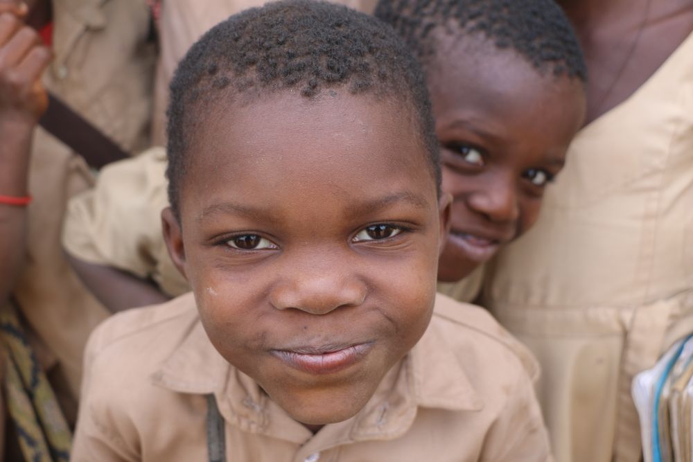 Smiling schoolchildren looking into the camera