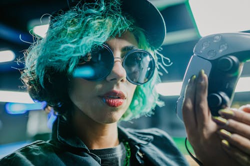 Woman in Sunglasses and with Dyed Hair