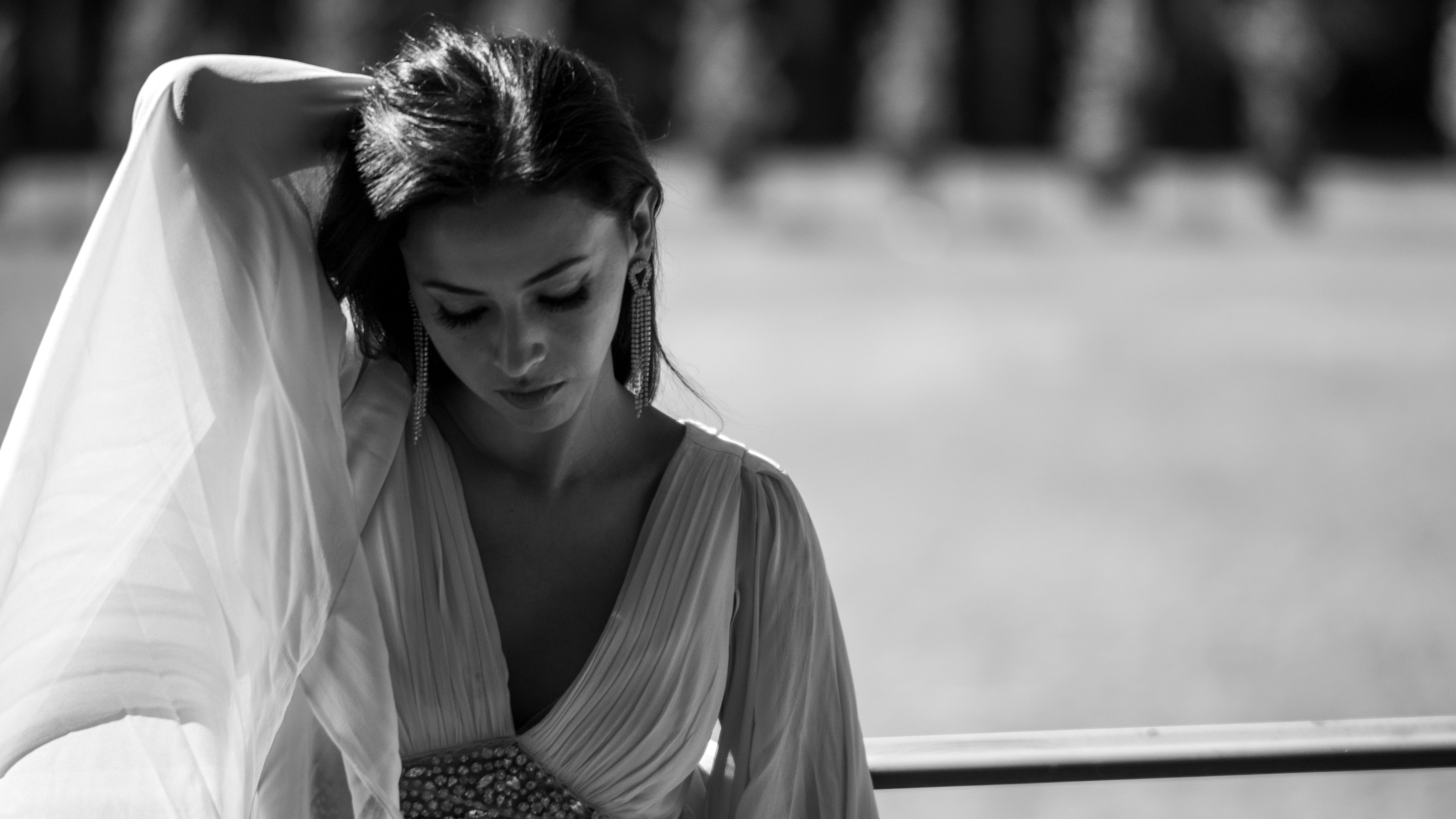 Woman Posing on a Beach in Black and White · Free Stock Photo