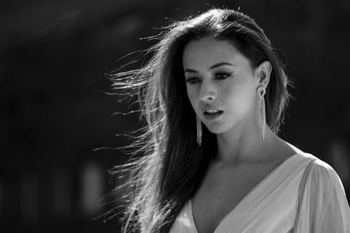 Brunette Woman Wearing Tulle Dress in Black and White 