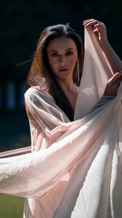 Brunette Woman Wearing Tulle Dress 