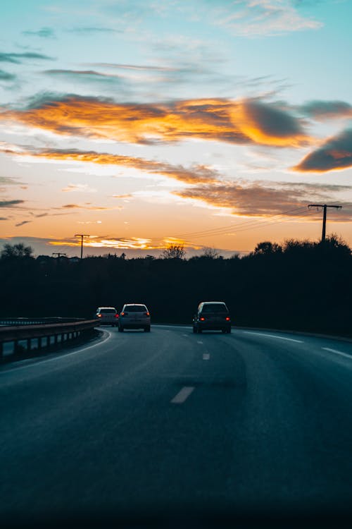 Black Top Road during Sunset · Free Stock Photo