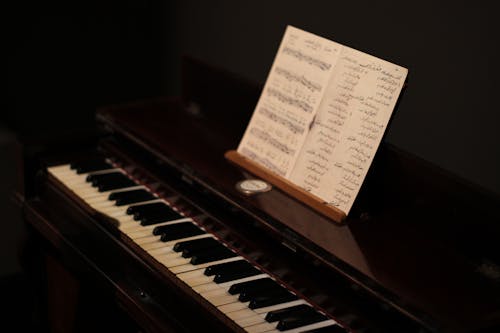 Sheet Music on a Small Vintage Piano