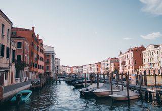 Discover the charm of Venice's canals, offering a glimpse of historic architecture and tranquil waterways.