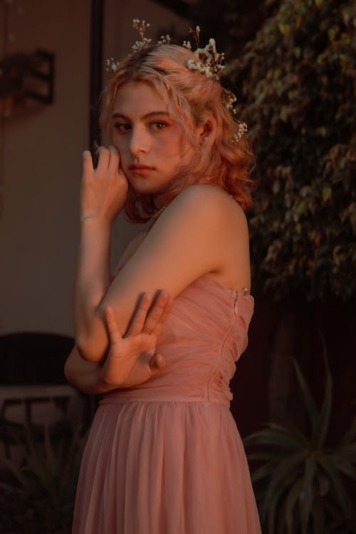 Blonde Model Posing in Pink Dress