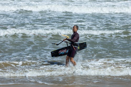 Man with Kitesurfing Equipment