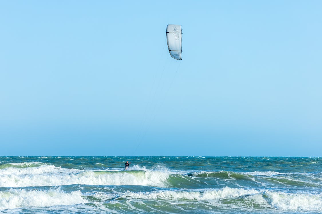 Kite over Surfer on Sea · Free Stock Photo