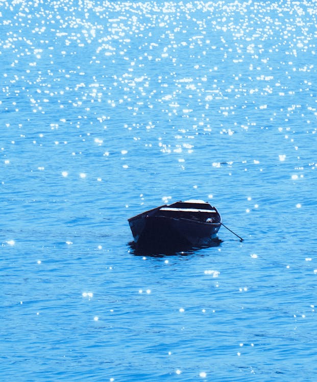 Boat in Glistening Sea