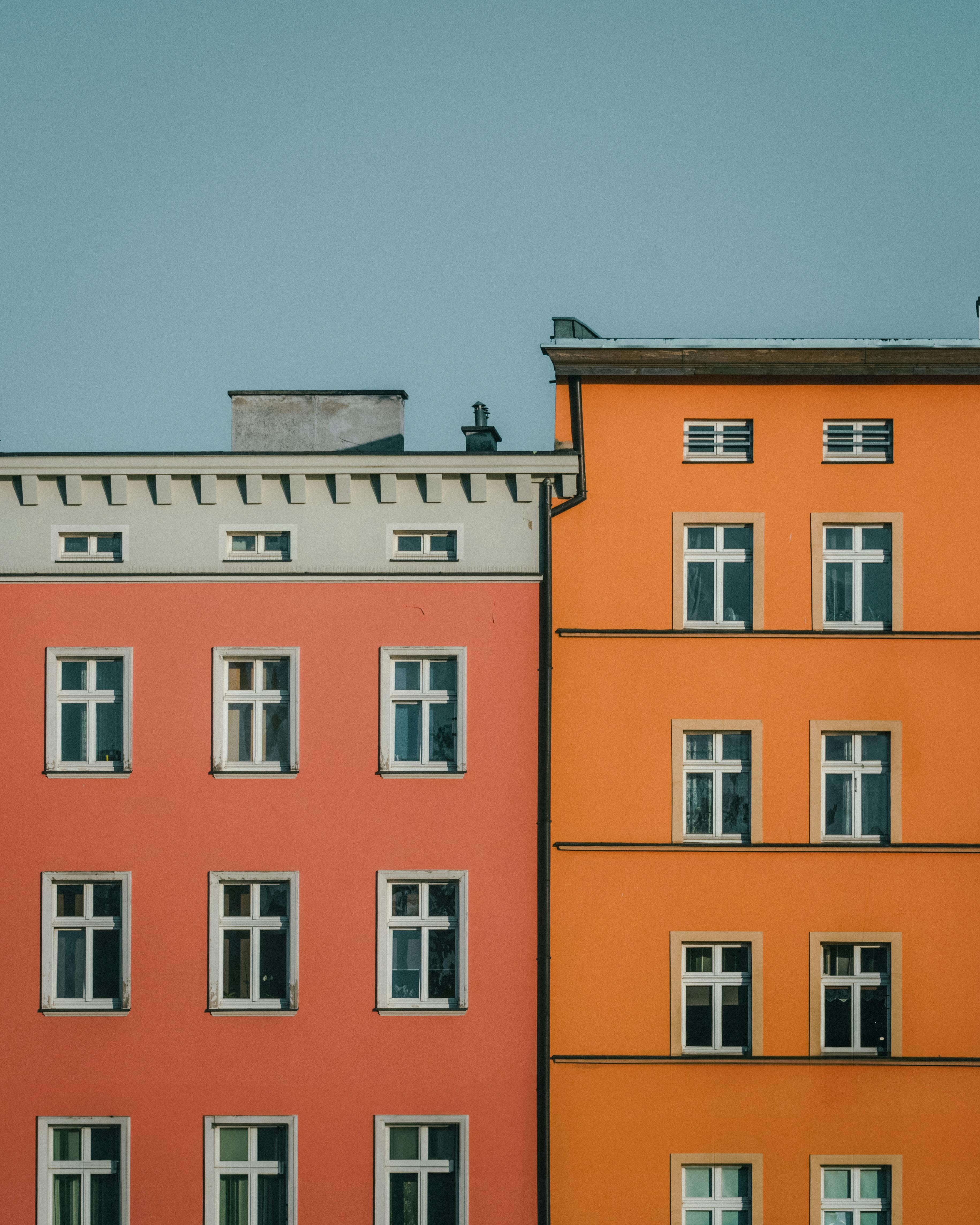 Vibrant facades of residential buildings in Wrocław, Poland, showcasing architectural charm.