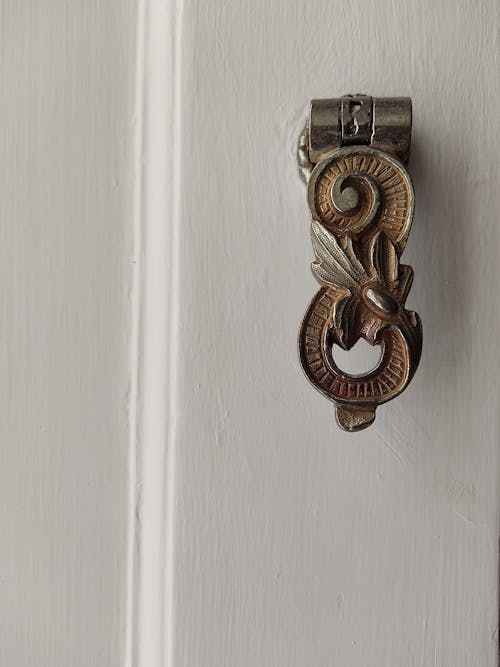 A door knob with a decorative design on it