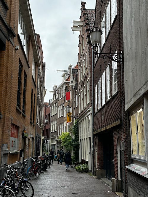 Bikes in Narrow Alley in City