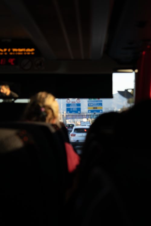 Free stock photo of bus, cars, evening road