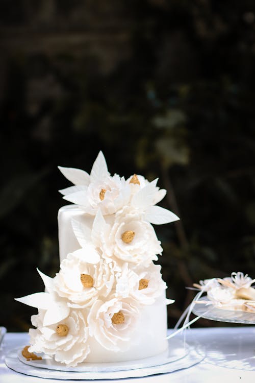 A white cake with flowers on top