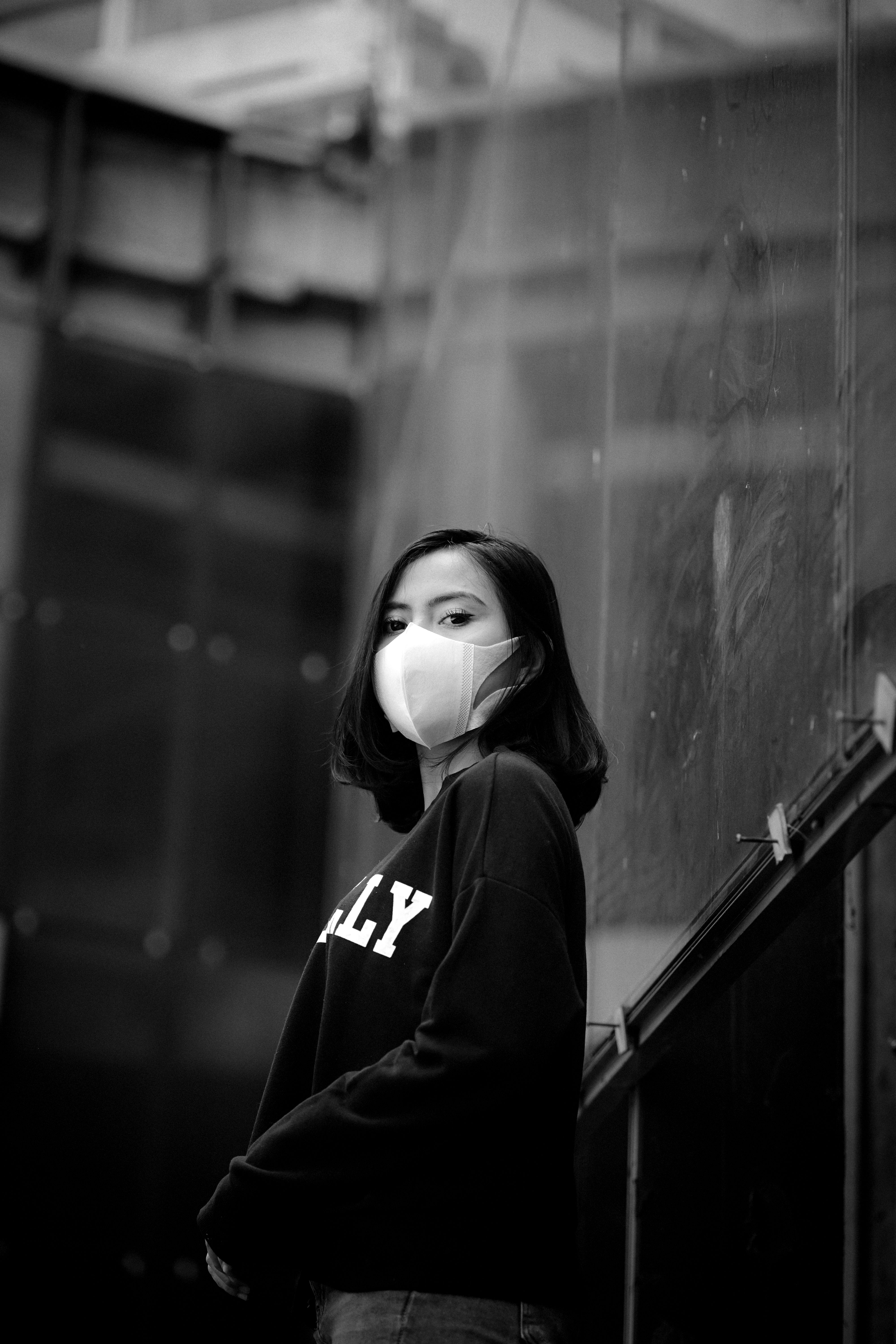 Black and White Photo of a Young Woman Wearing a Face Mask · Free Stock ...