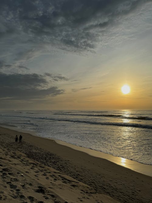 Foto profissional grátis de à beira-mar, alvorecer, beira-mar