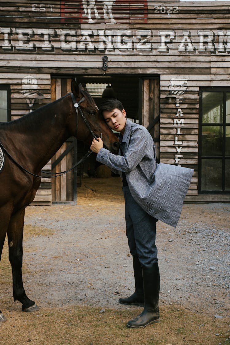 Man In Suit Hugging Horse