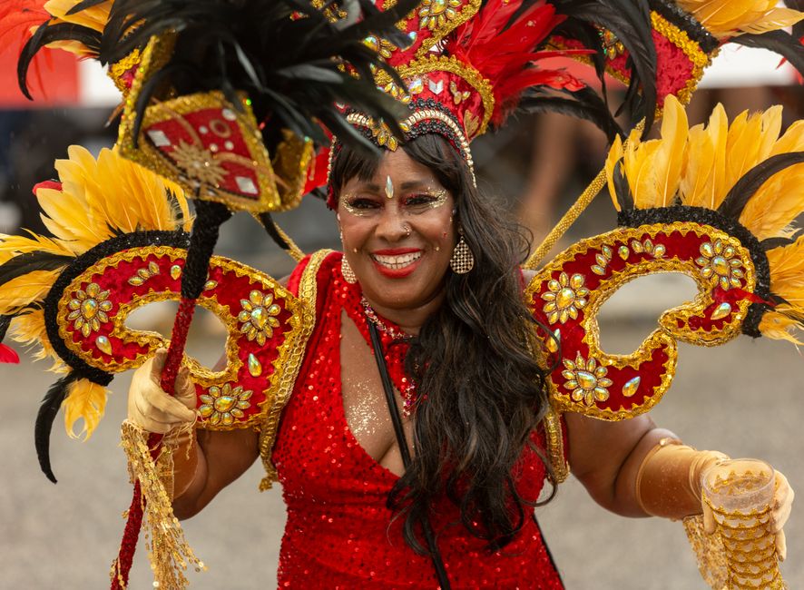 Vibrant carnival parade with tropical dancers and jungle backdrop in Manaus