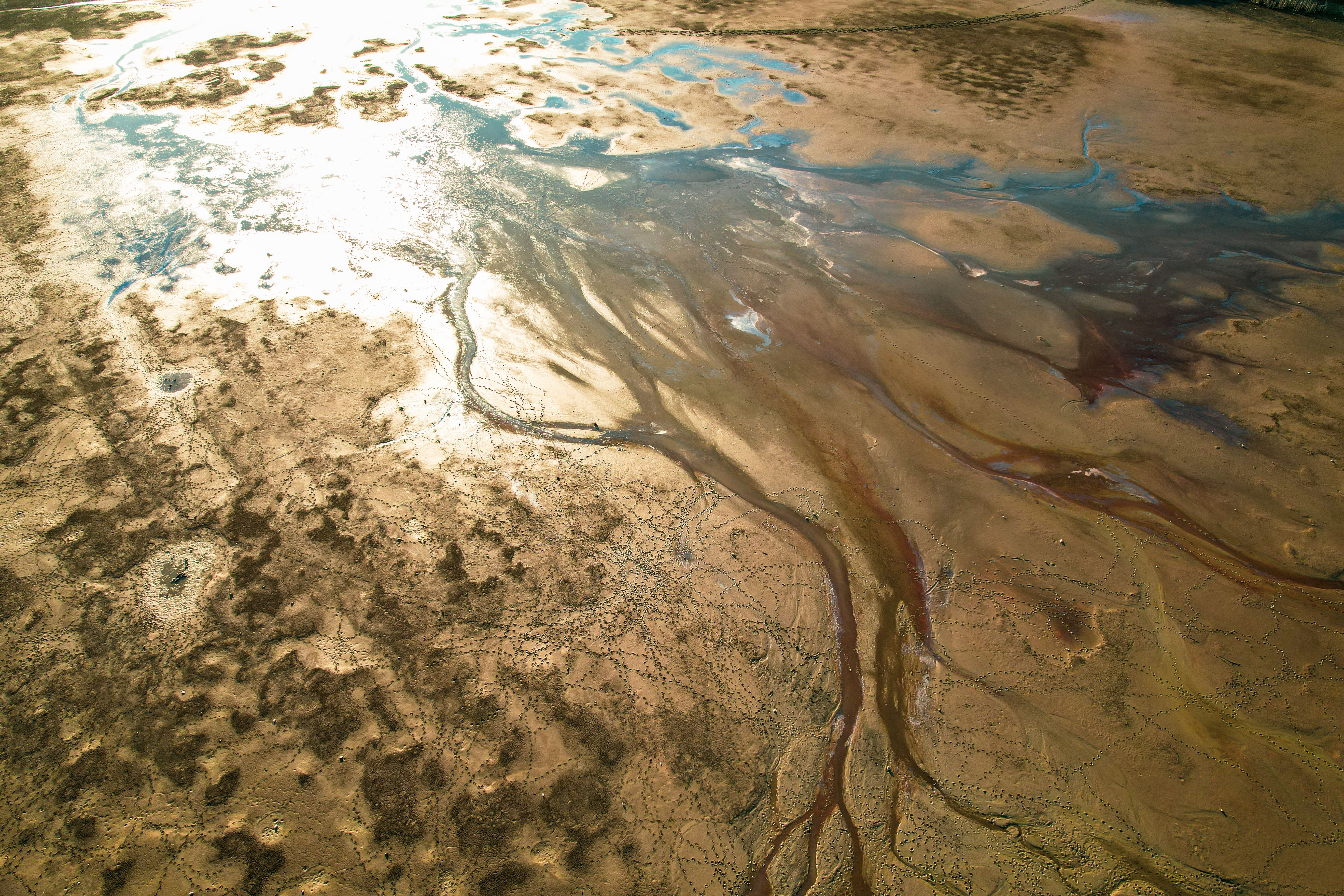 Shallow River on Desert at Sunset · Free Stock Photo