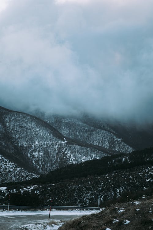 Free Cloud over Hills Stock Photo