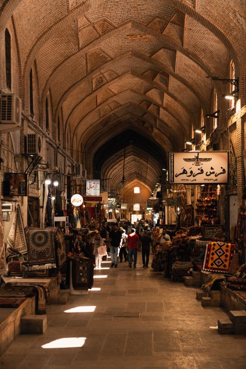 Free Explore the historic Vakil Bazaar in Shiraz, Iran, a vibrant interior filled with local wares and culture. Stock Photo